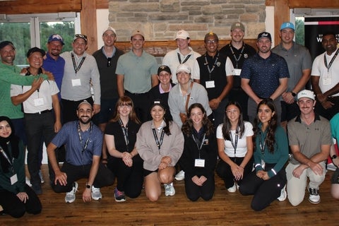 A group of people smiling
