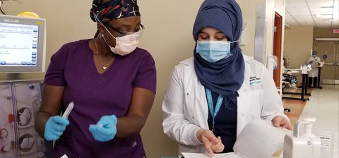 A renal nurse working with Amna Al-Khayat at Credit Valley Hospital