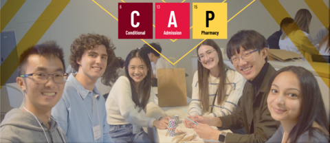 CAp students with periodic table graphic spelling out conditional admission to Pharmacy