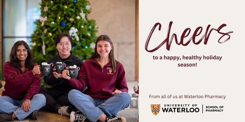 Students holding up mugs. Cheers to a happy, healthy holiday season from all of us at Waterloo Pharmacy.