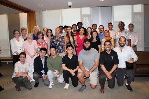 A group of people smiling