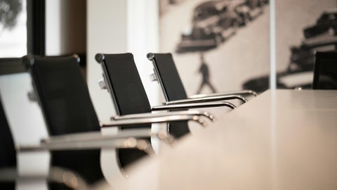 Empty chairs in a business meeting room