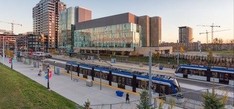 light rail trains pass by School of Pharmacy on King Street