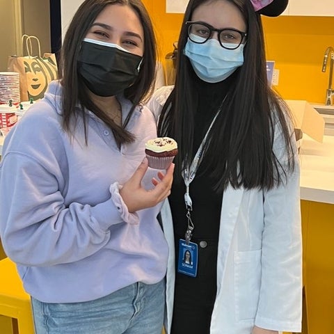 Two women in masks