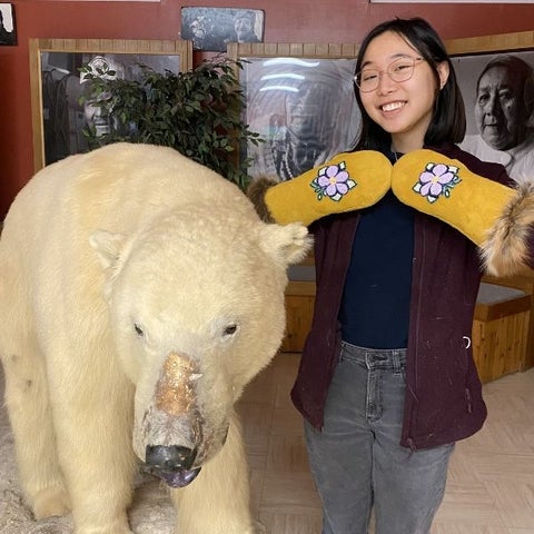 Kelsey Mar wearing beaded gloves