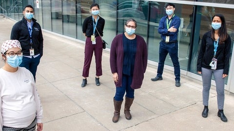 Group of people in covid masks