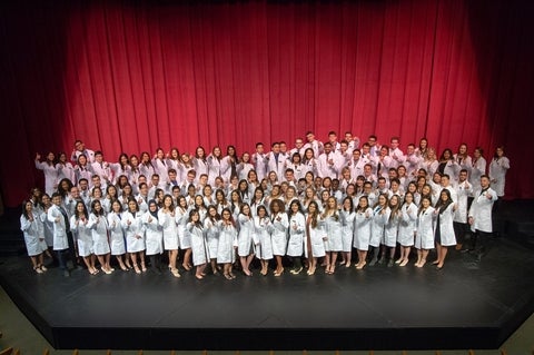 Pharmacy students group shot with thumbs up