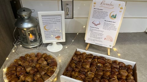 Trays of dates displayed next to Ramadan resources