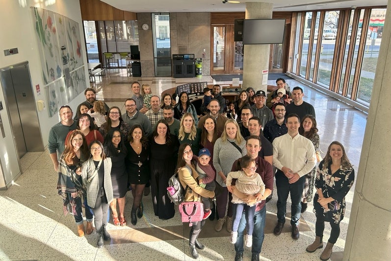 A group of people smiling