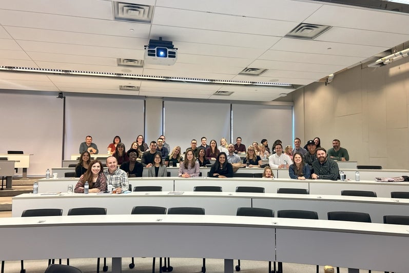 A group of people in a classroom