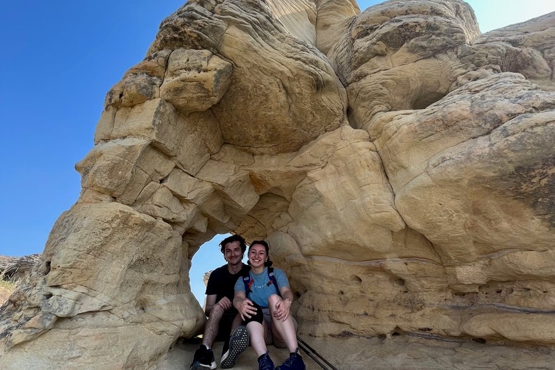 Matthew and Mackenzie smiling at Writing on Stone Provincial Park, Alberta 