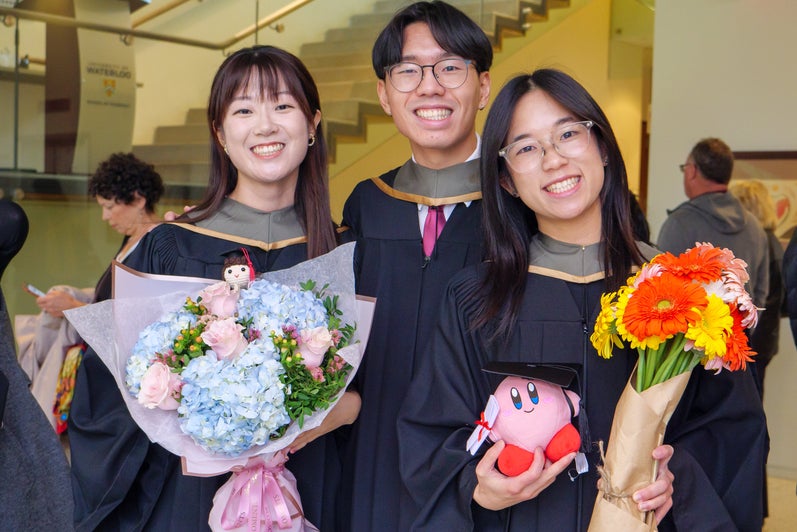 A group of graduates smiling