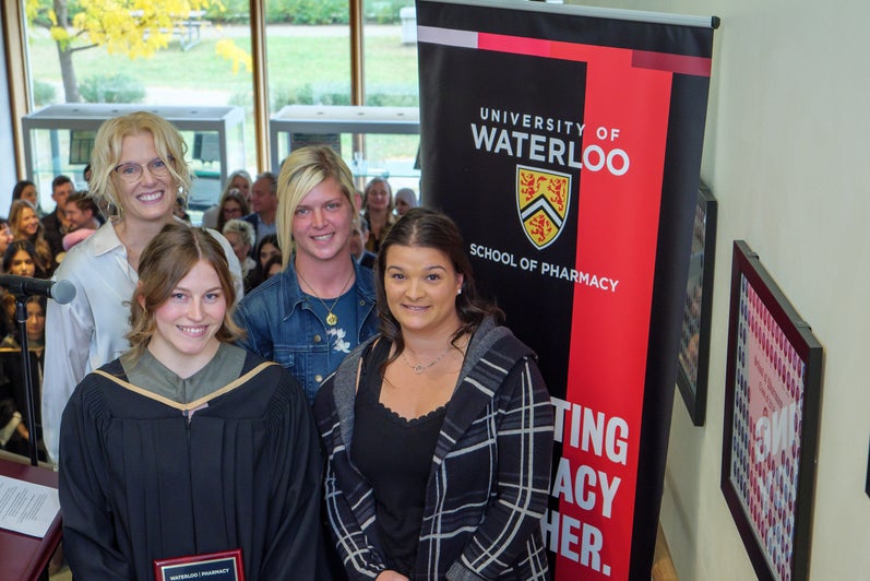 A group of people smiling