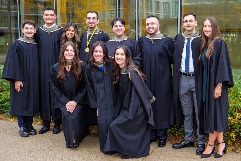 A group of graduates smiling