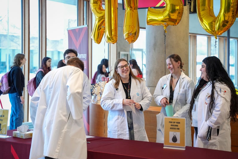 A group of students smiling and laughing