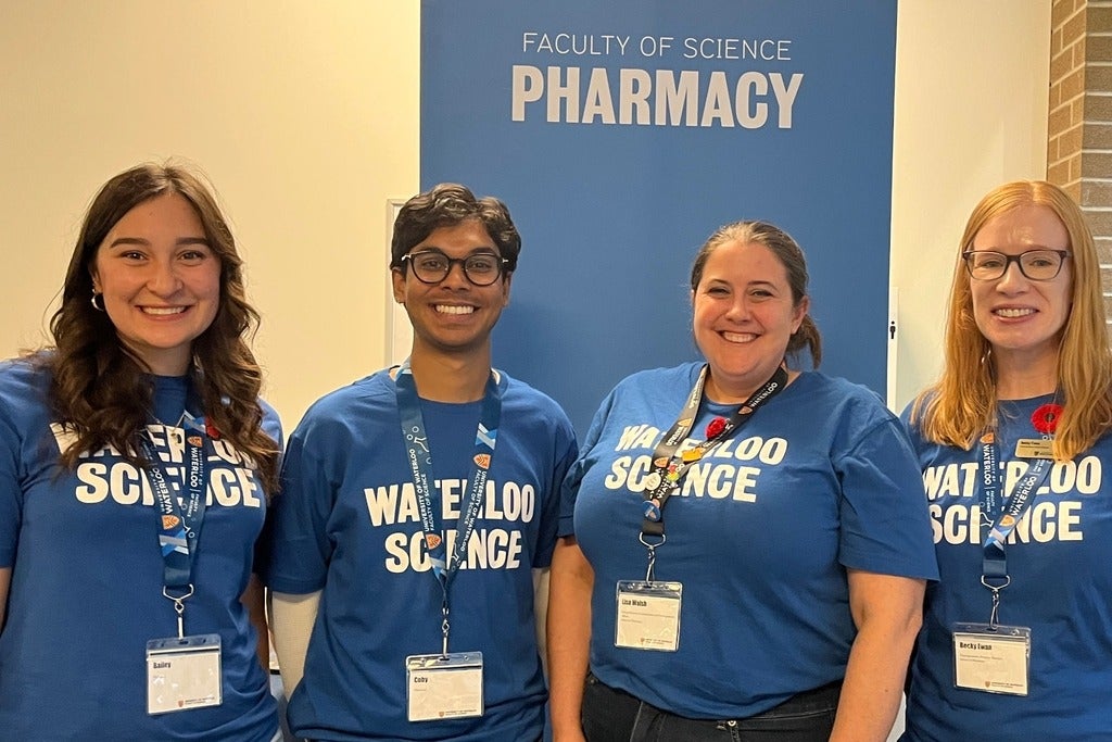 People smiling in Waterloo Science tshirts