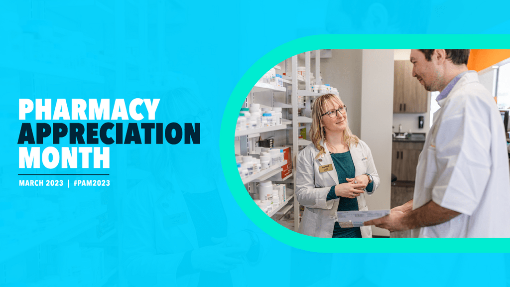 Two pharmacists speaking to one another.