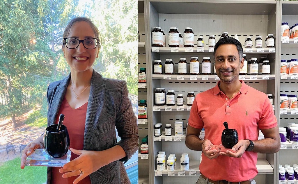 Sukhmani and Vishal holding their awards. Photo credit: Kamaljit Bedi and Madeleine Carrigan.