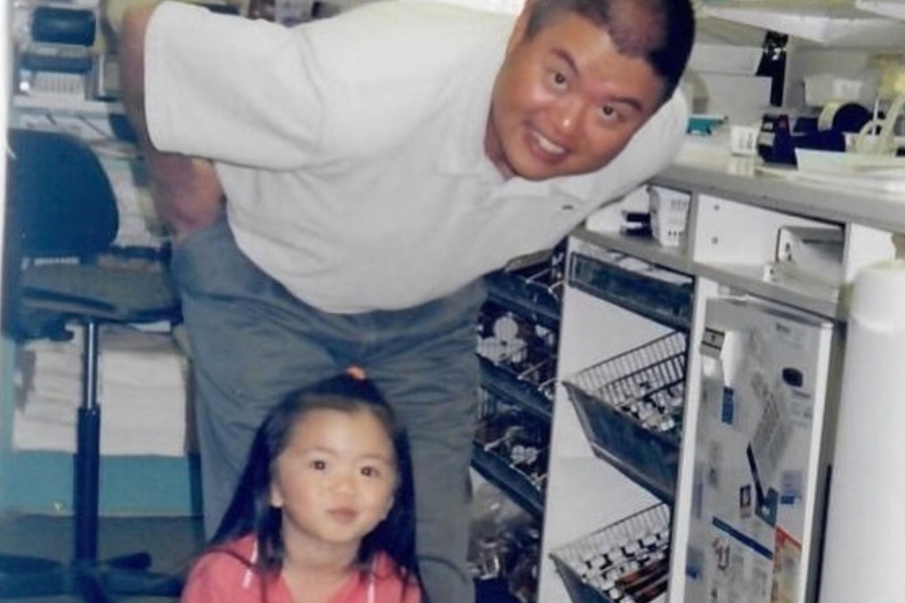 An adult and young child together in a pharmacy