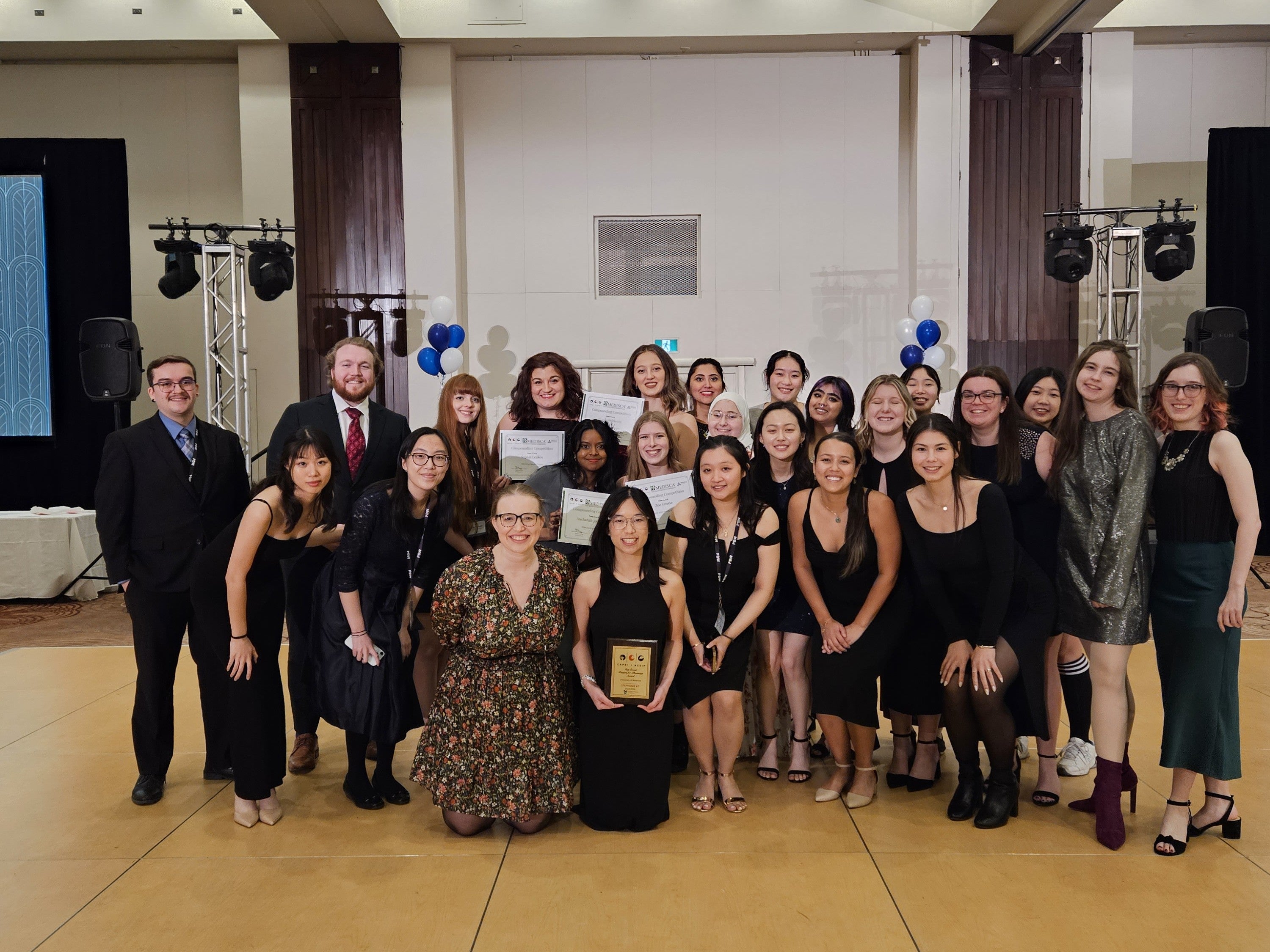 CAPSI delegates in semi formal wear at gala