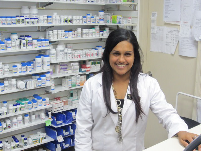Student standing at pharmacy counter