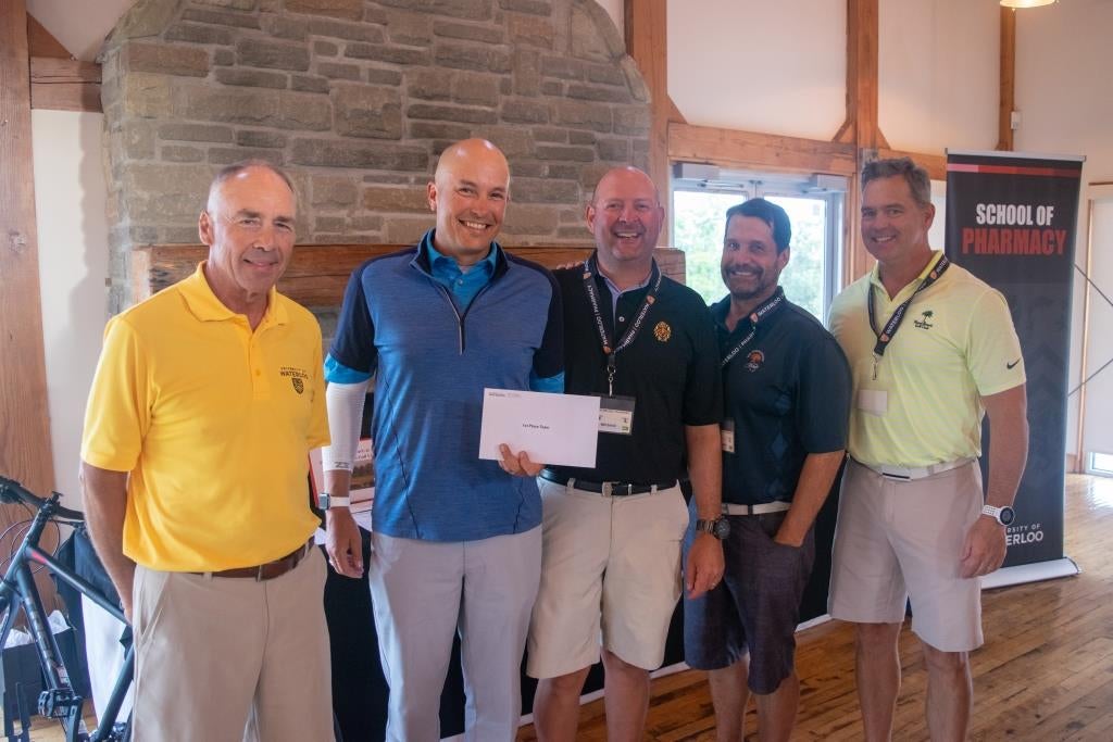 Dave Edwards with the winning golf foursome
