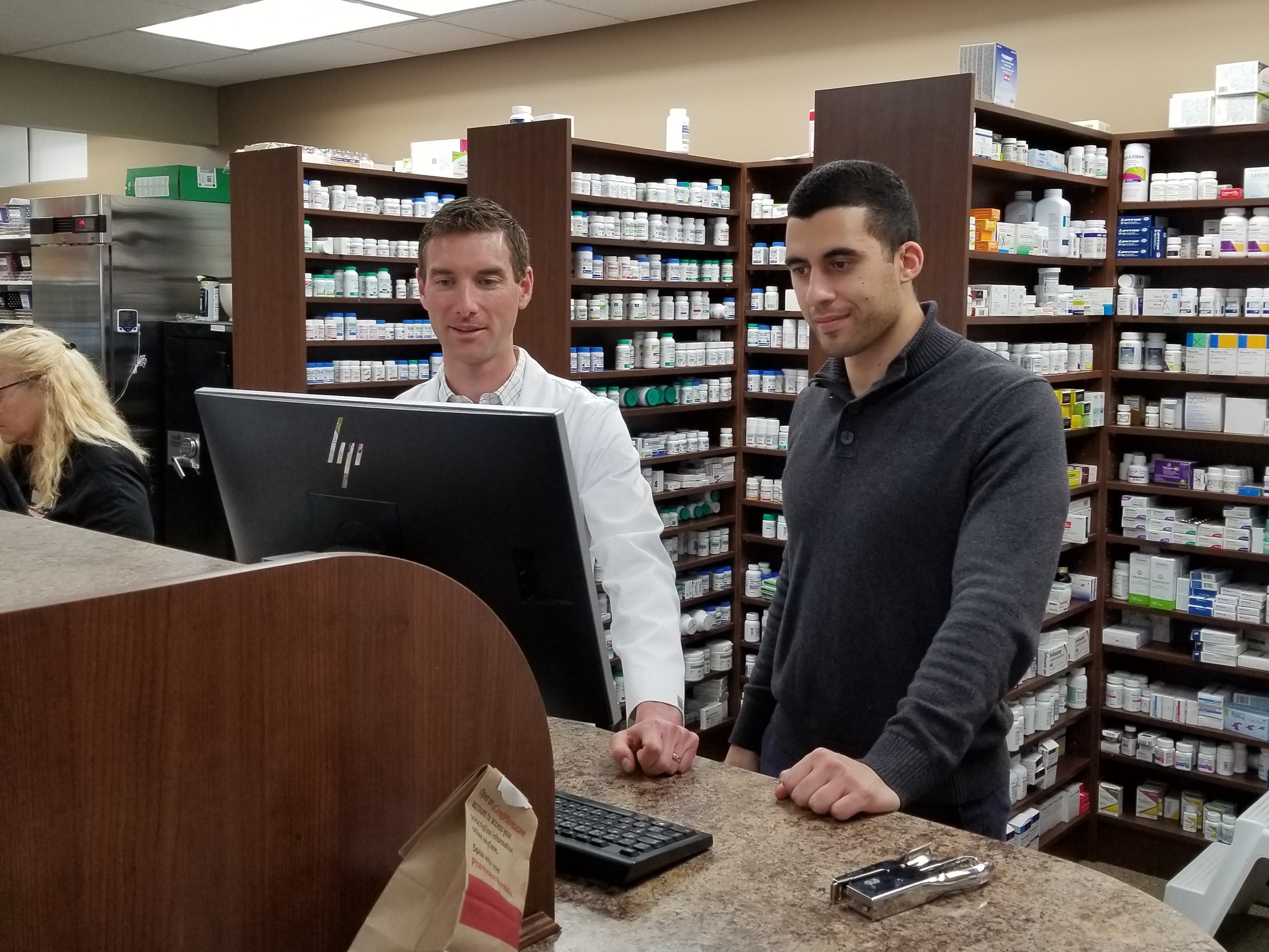 Chris Hartman and Sammy Shahato, a fourth year pharmacy student on rotations 