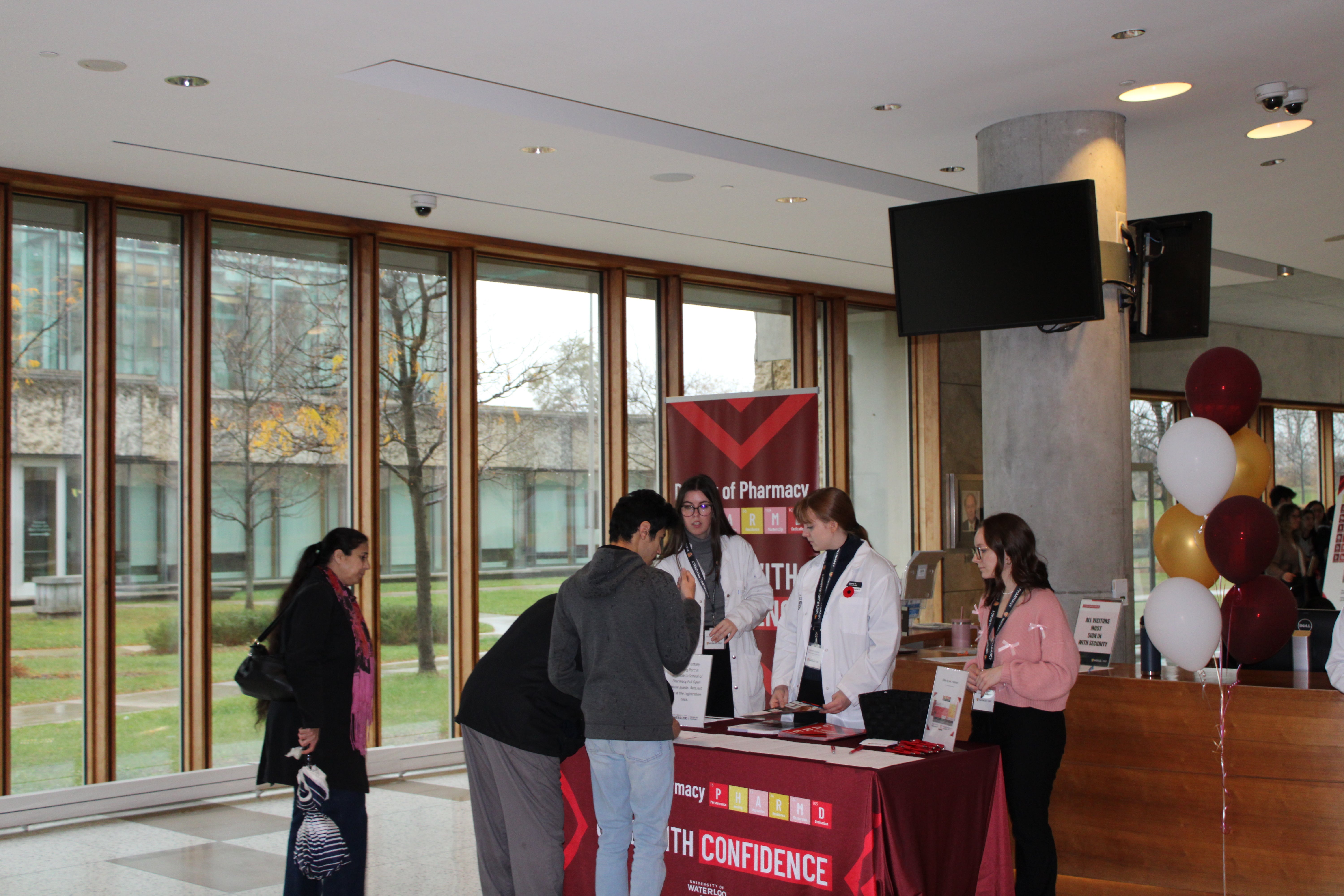 A group of people registering at a table