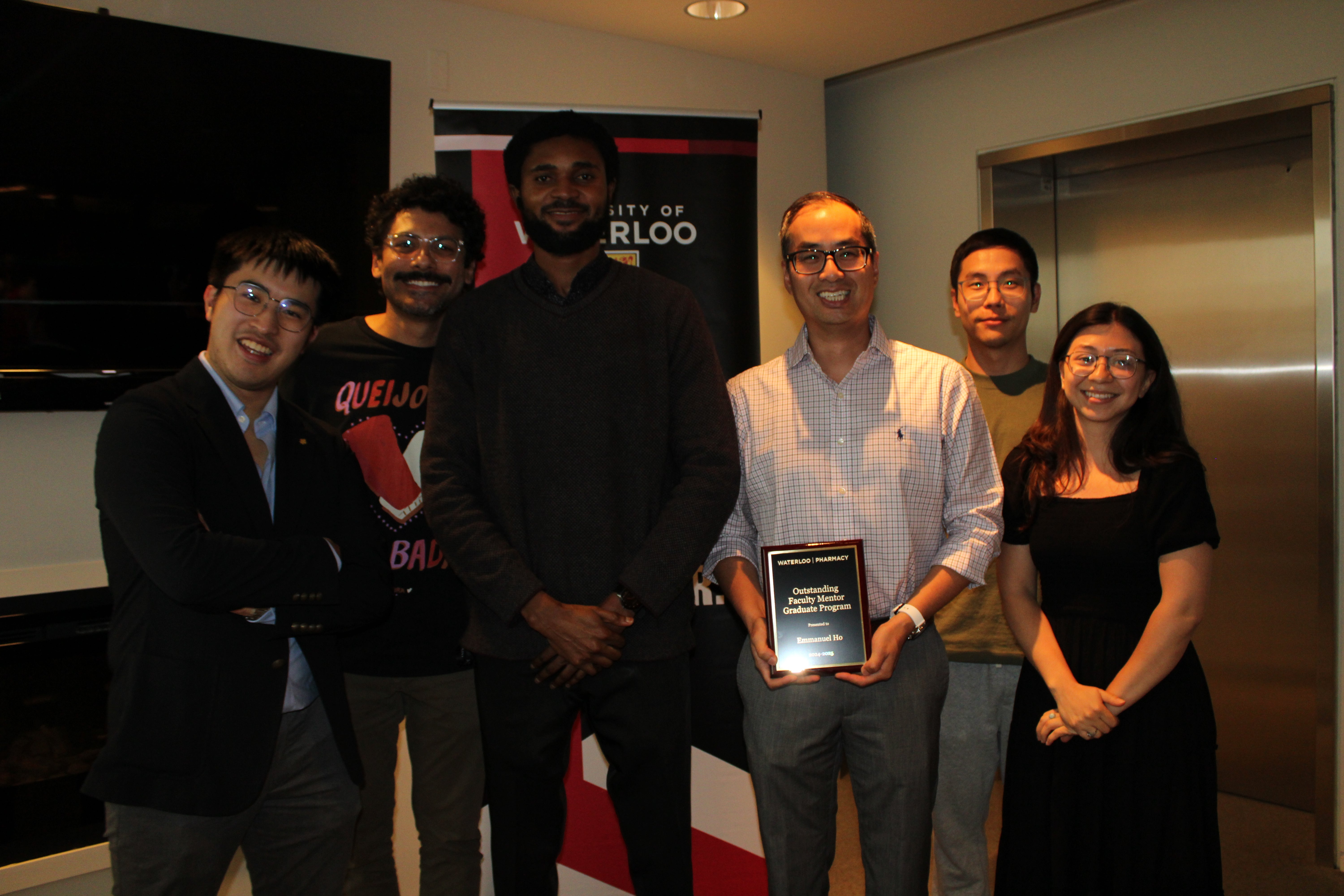 A group of people smiling