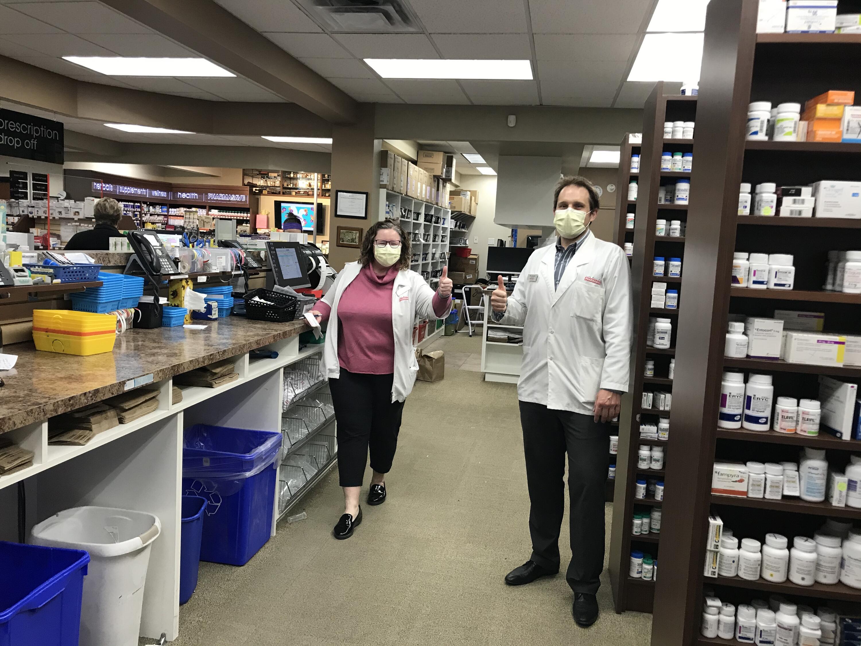 Melanie and Ben in the pharmacy weae\ring masks