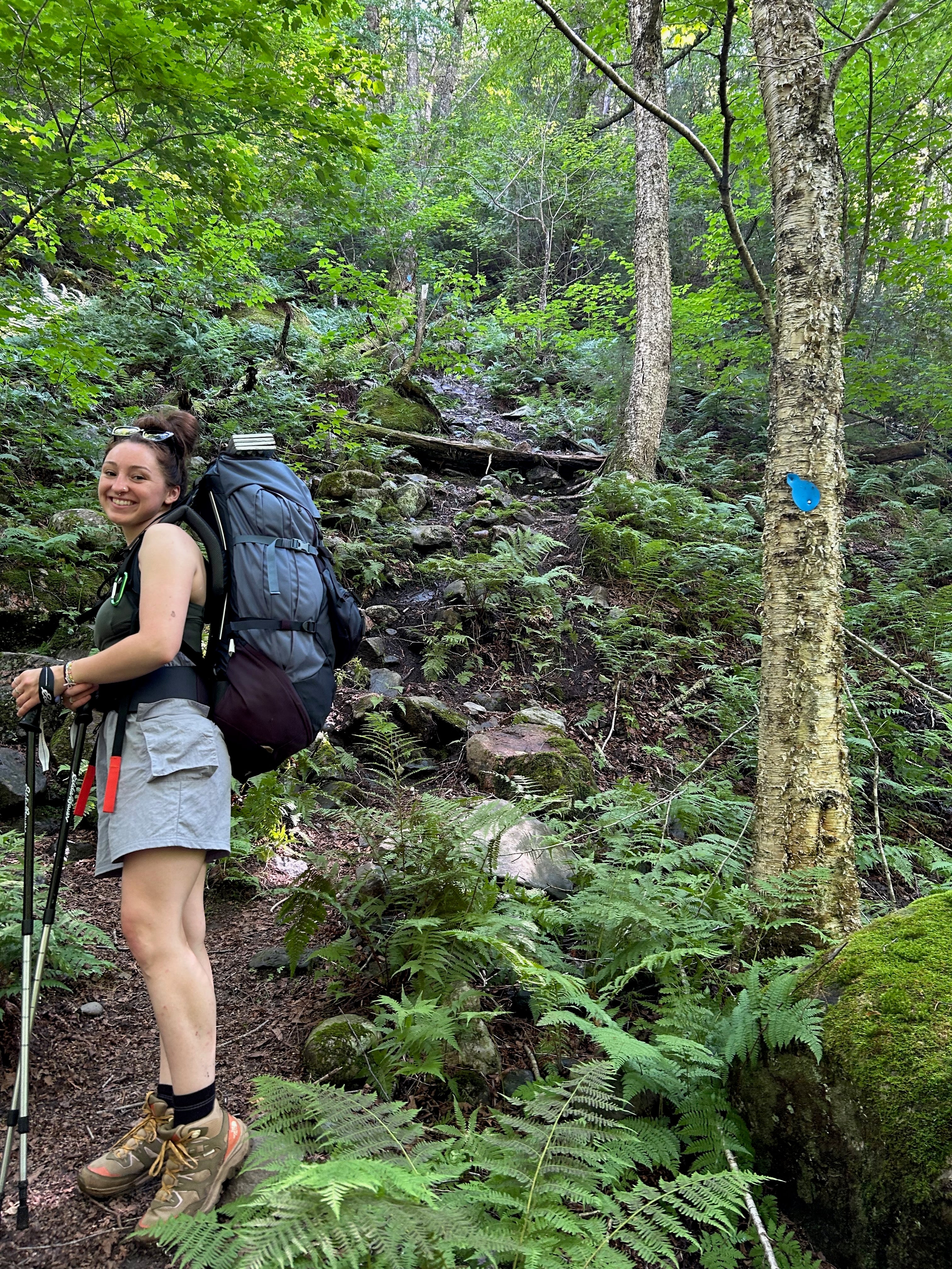Mackenzie Gowlett hiking with a backpack