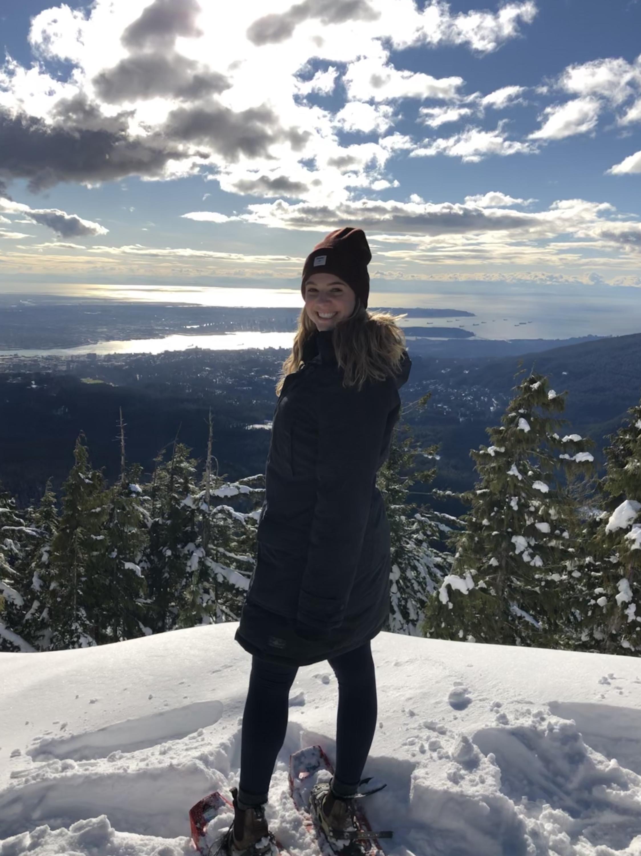 Nikki snowshoeing in the mountains