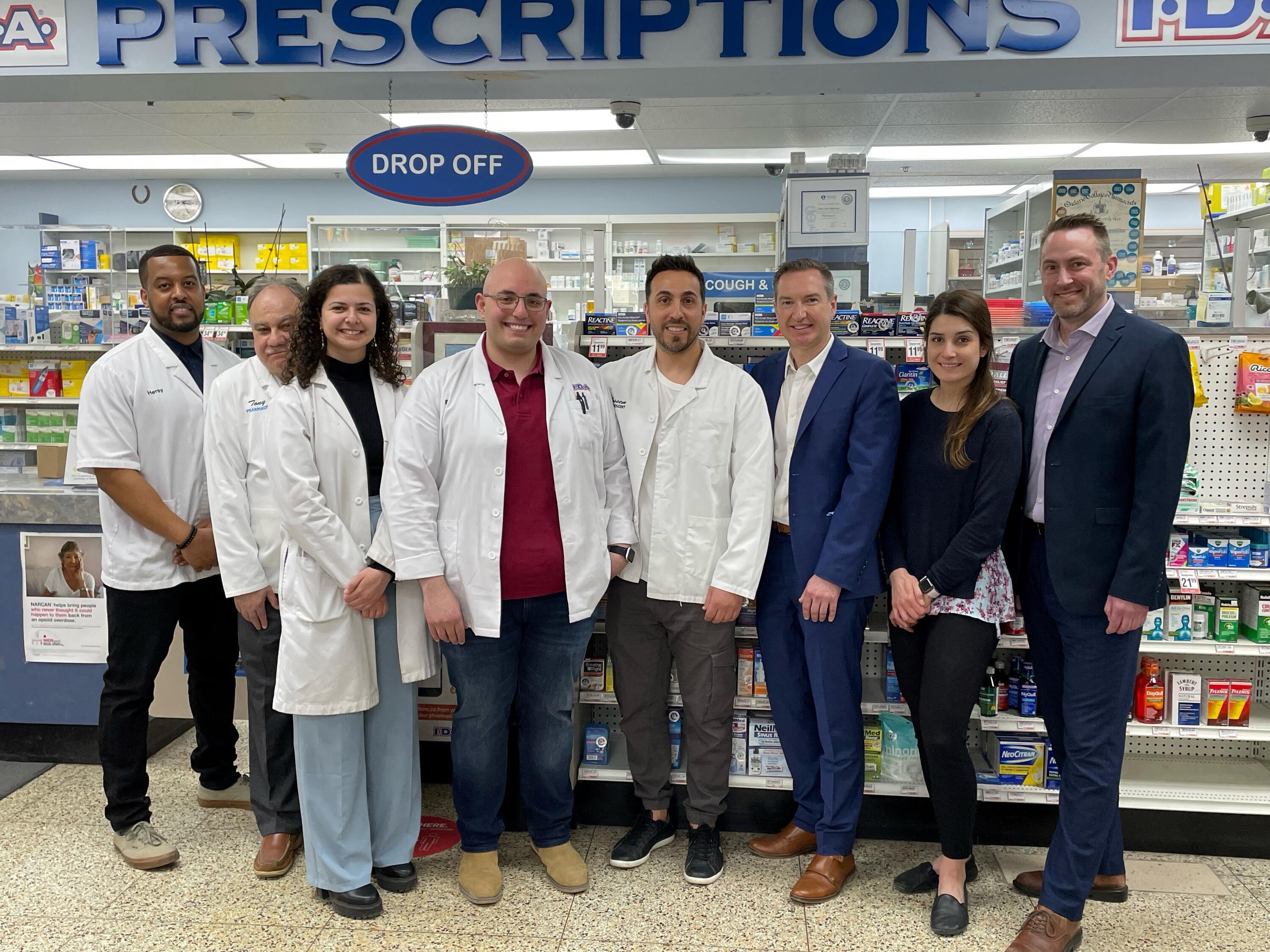 Group of pharmacists at a pharmacy