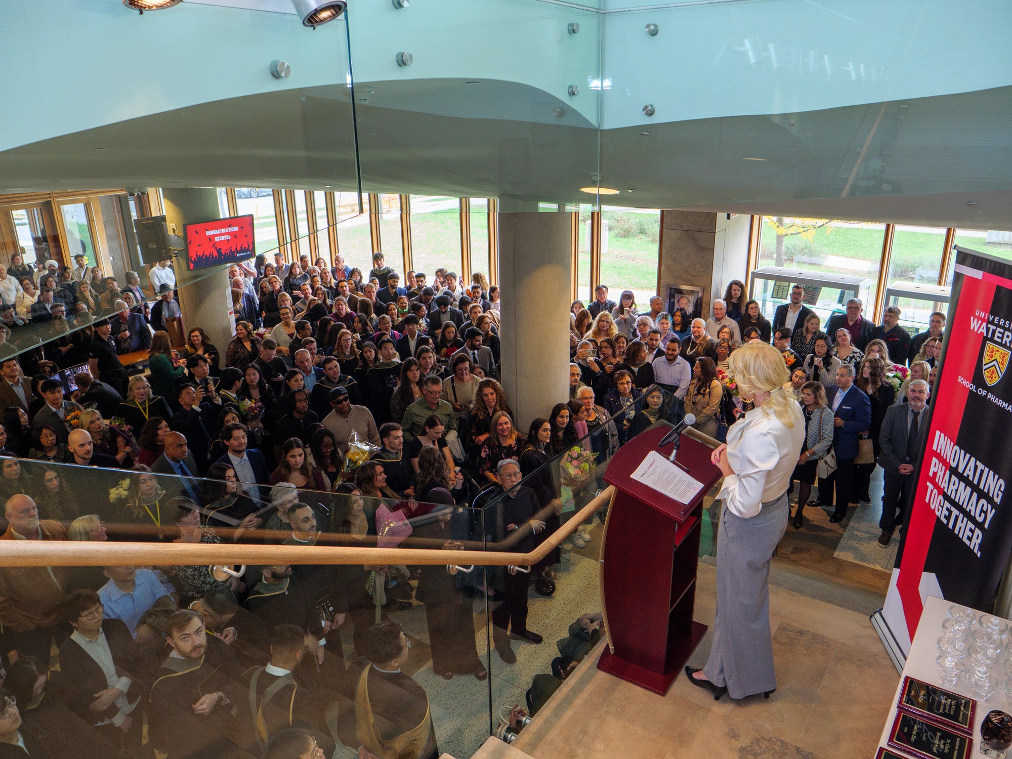 Andrea Edginton giving a speech to a room full of people