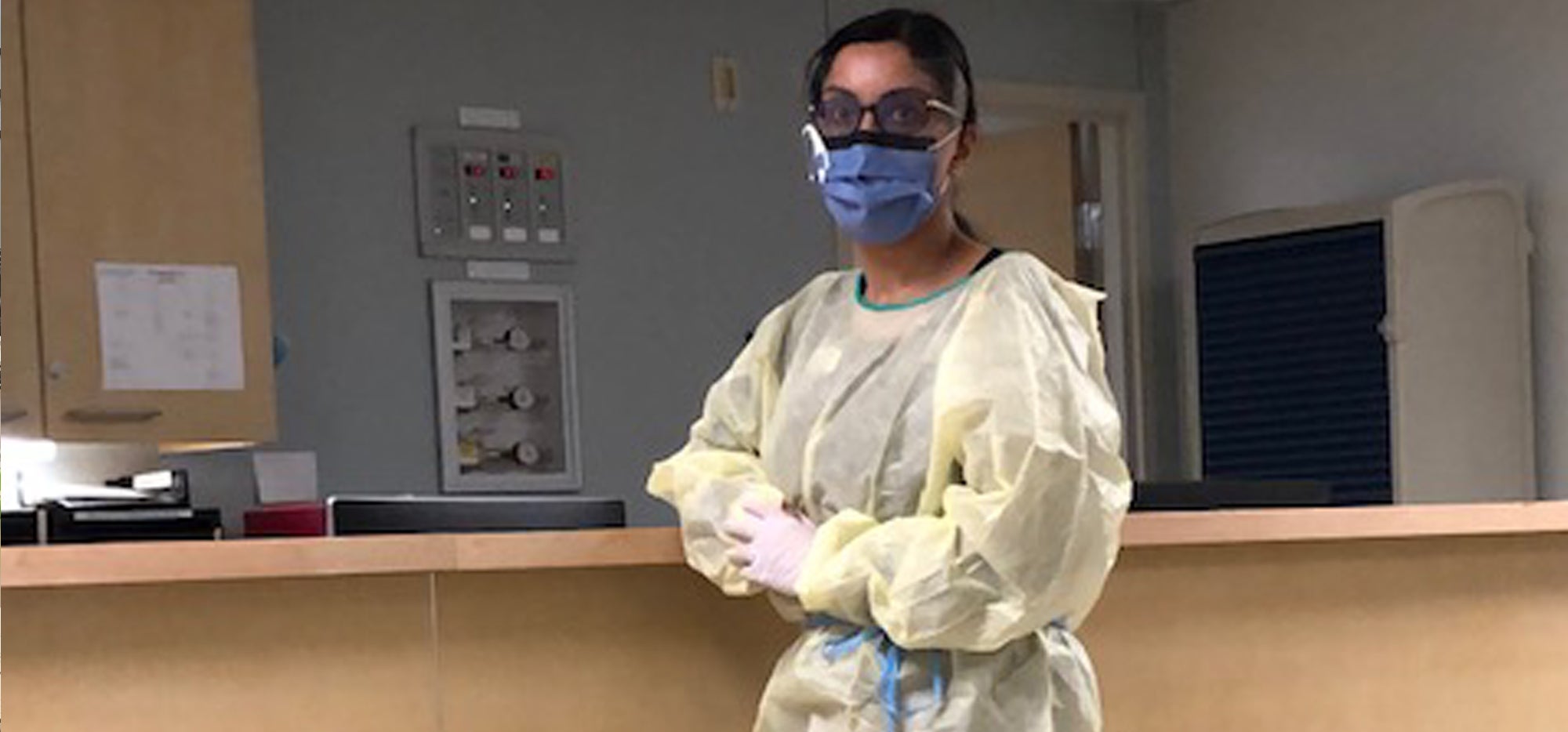 Rita Dhami in protective equipment at the hospital