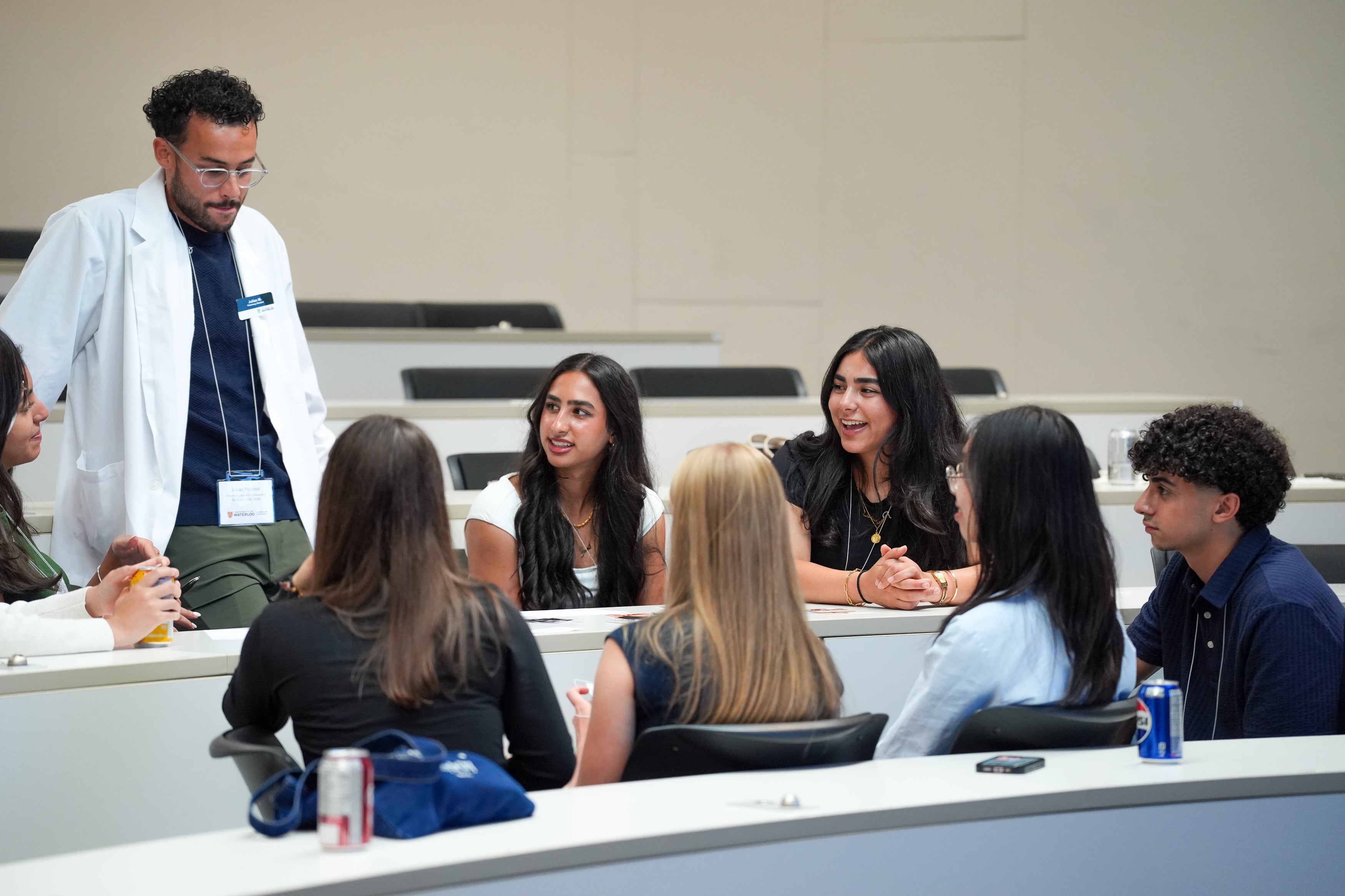 Students in discussion in a small group in a classroom