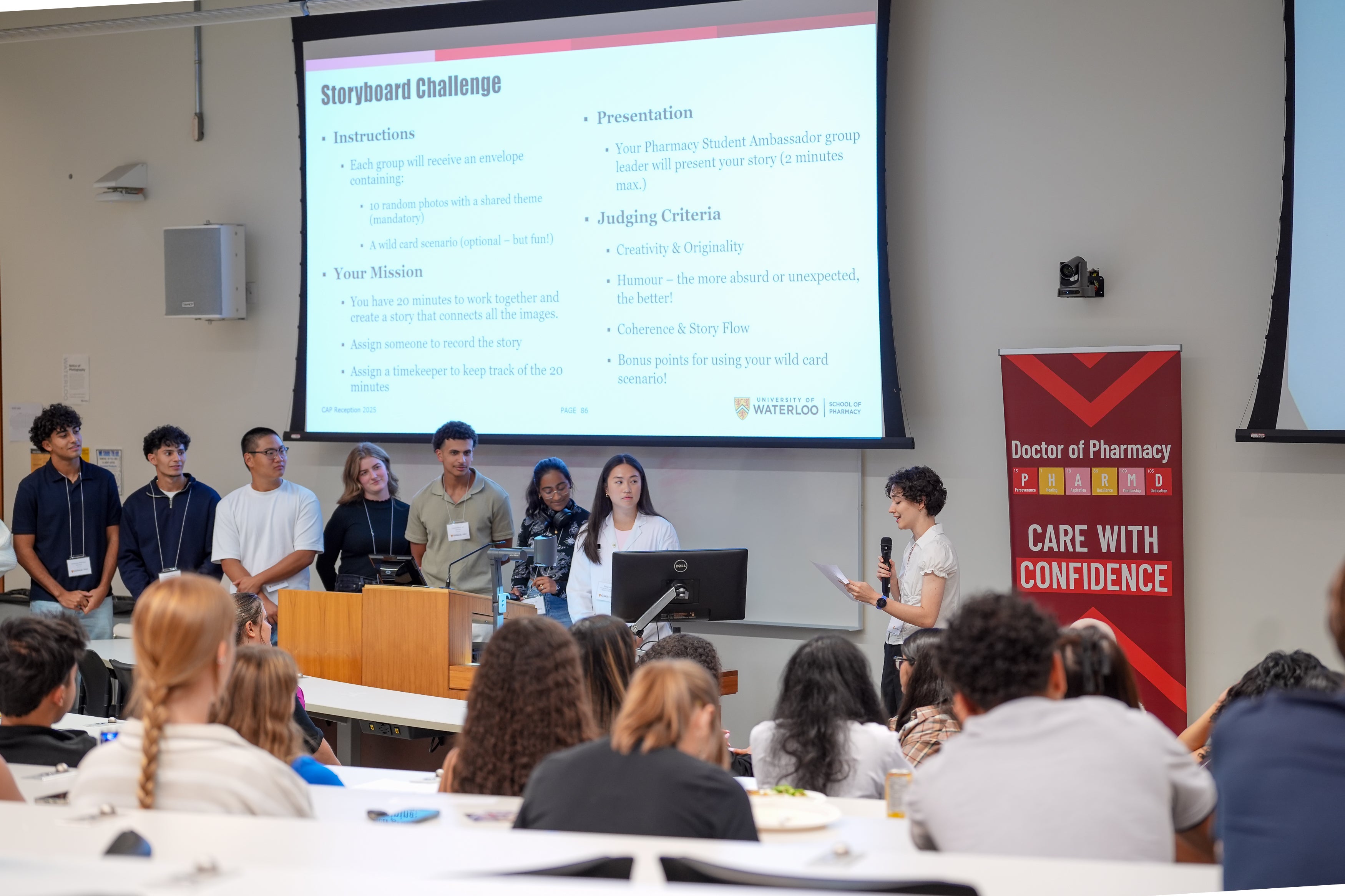 Students presenting at the front of a classroom