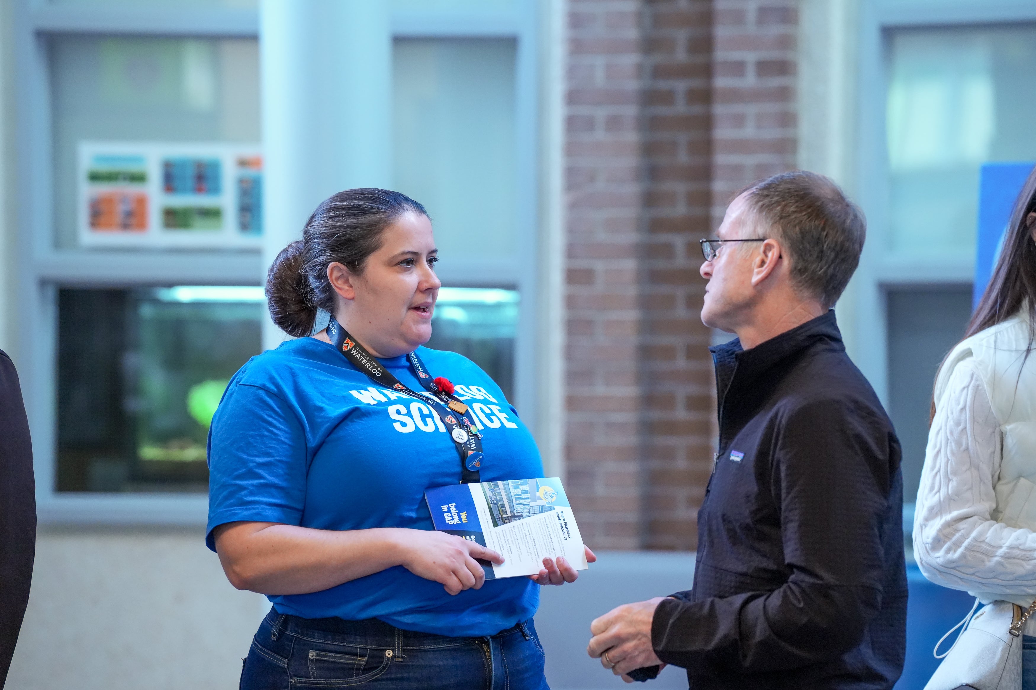 Lisa Walsh speaking to a parent at Fall Open House