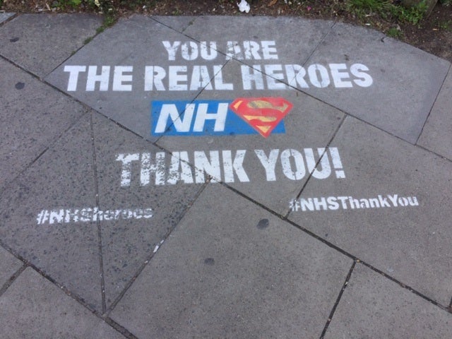 Sidewalk art that reads: You are the real heroes NHS. Thank you!