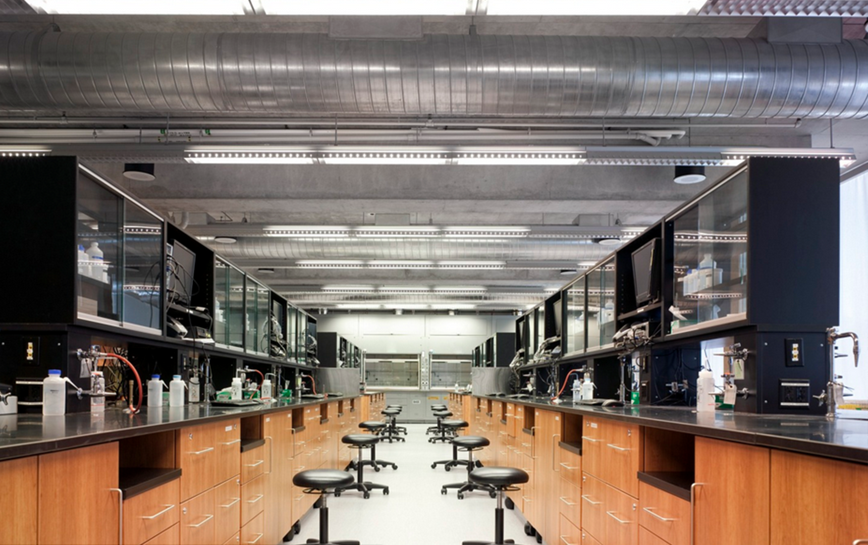 lab benches with empty stools in front of them