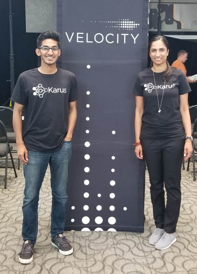 Ahmed and Aliya with a Velocity banner
