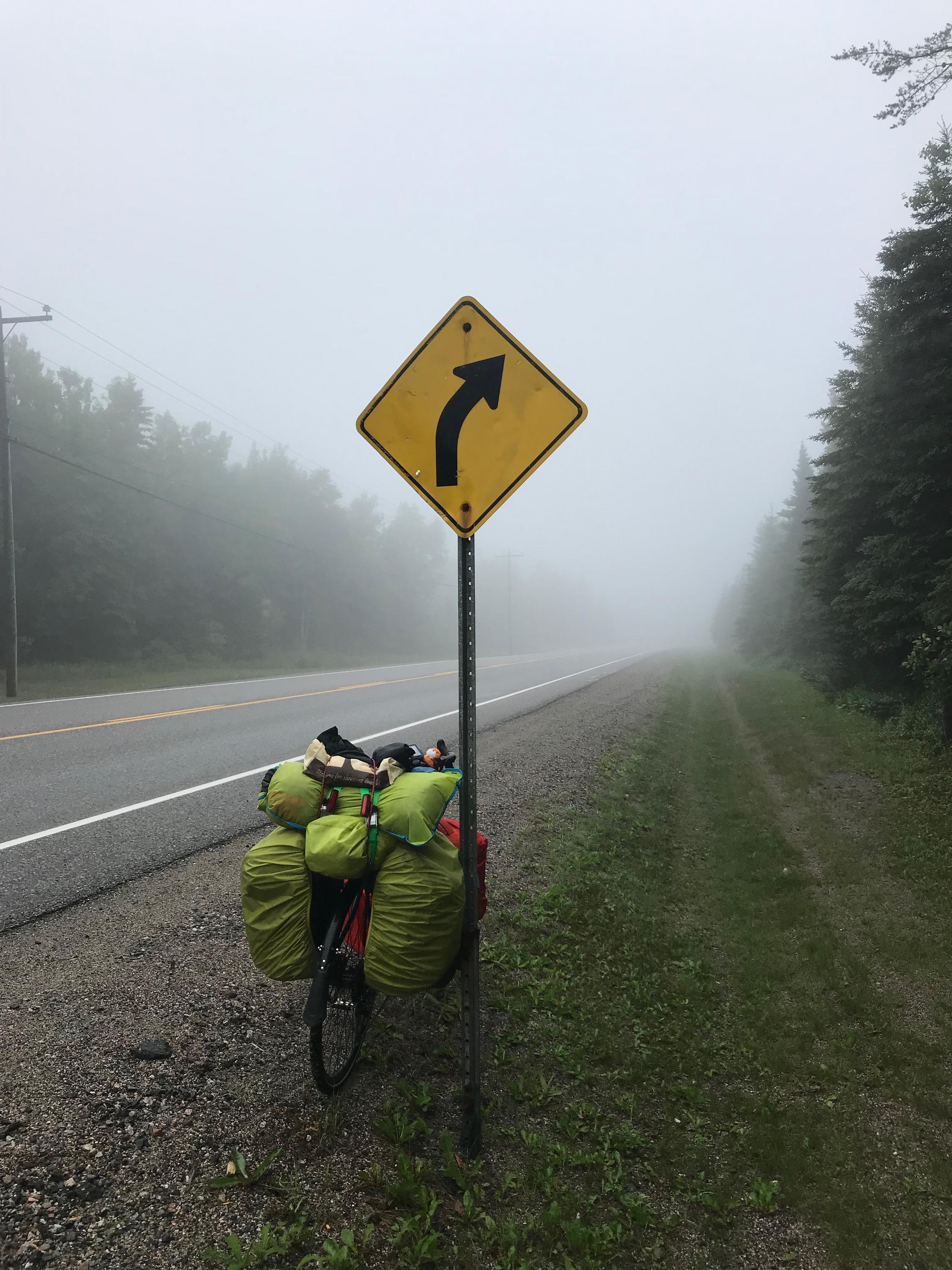 Bicycle in front of a road sign