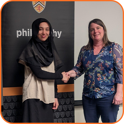 Doreen Fraser presenting to Iman Khasimuddin