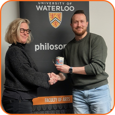 Jennifer Saul presenting to Eric Devall