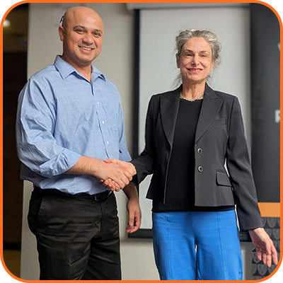 Patricia Marino presenting to Ashar Khan