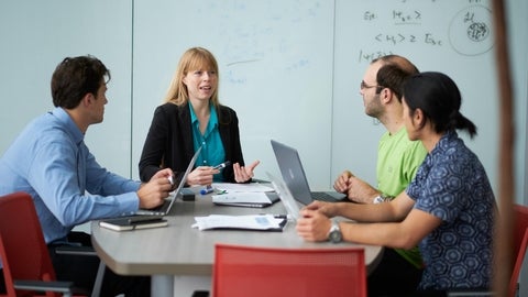 Dr. Christine Muschik with postdoctoral fellows