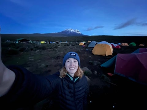Day 2: Selfie with camp and summit in background