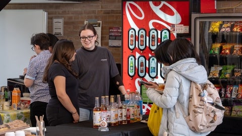 Students hosting the Fem Phys Study Cafe event.