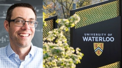 Will Percival next to the University of Waterloo main entrance sign.