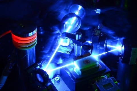 Tabletop laser firing in two directions.